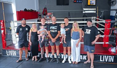 Local boxing stars Max Reeves (third from left) and Blake Wells (third from right) are all set for their big boxing bouts this Friday on the Nikita Tsyzu versus Michael Zerafa undercard in Brisbane. They are pictured with Reeves' manager, Dylan Bolton, partner and son, Millie Farley and Reggie Reeves, trainer Paul Carroll, Wells' son, Sonny, partner Abbey Sproule and manager Paul Hadden.