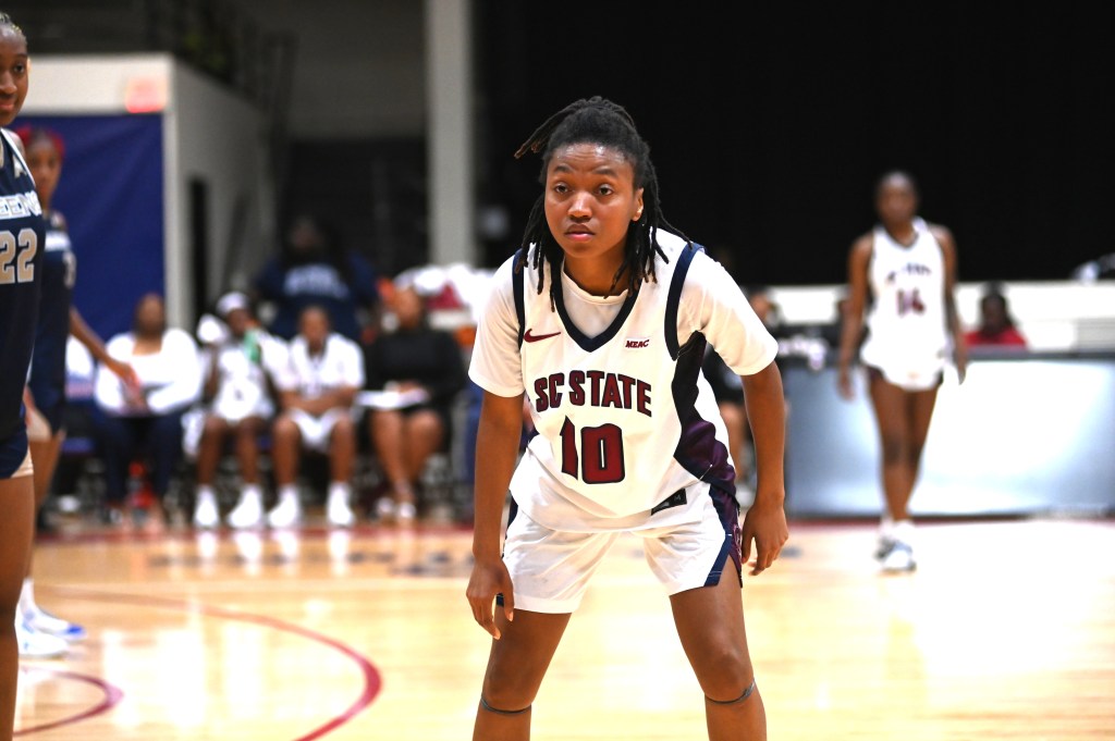 South Carolina State's Iemyiah Harris prepares to play defense as she stands in a stance.