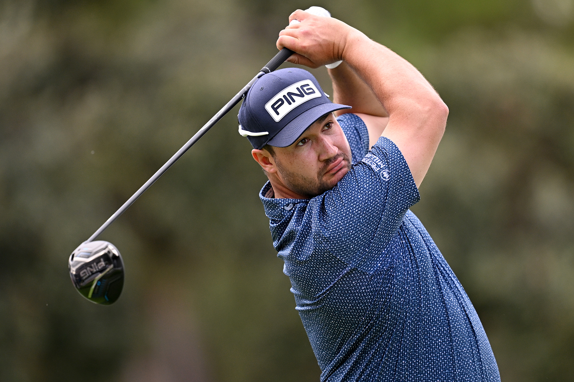 Thriston Lawrence in the finish position with a driver after hitting a tee shot