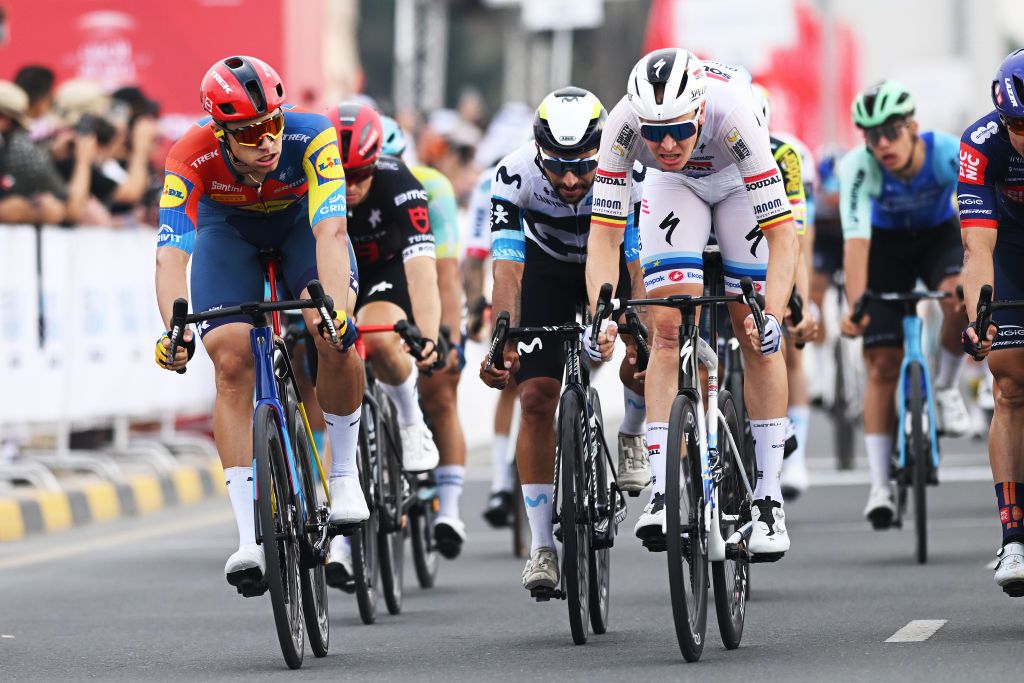 QIDFA, UNITED ARAB EMIRATES - FEBRUARY 20: (L-R) Jonathan Milan of Italy and Team Lidl-Trek, Fernando Gaviria Rendon of Colombia and Team Movistar Team, Tim Merlier of Belgium and Team Soudal Quick-Step cross the finish line during the 7th UAE Tour 2025, Stage 4 a 181km stage from Fujairah Qidfa Beach to Umm al Quwain / #UCIWWT / on February 20, 2025 in Fujairah Qidfa Beach, United Arab Emirates. (Photo by Dario Belingheri/Getty Images)