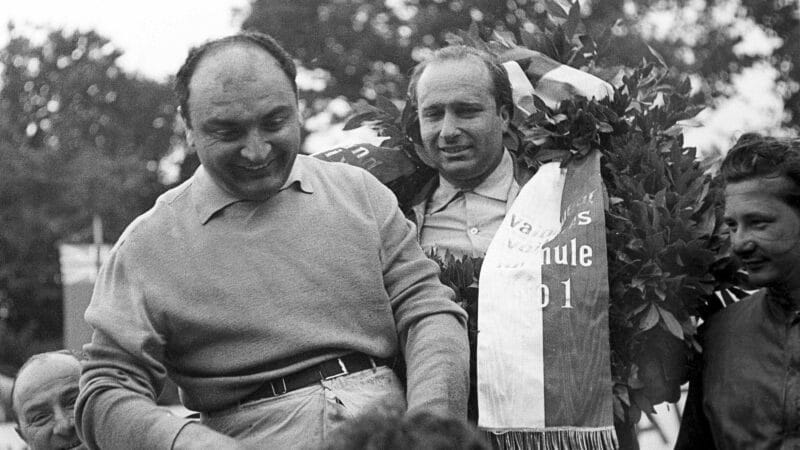Froilan Gonzalez with Juan Manuel Fangio and Hans Herrmann on the 1954 Swiss Grand Prix podium