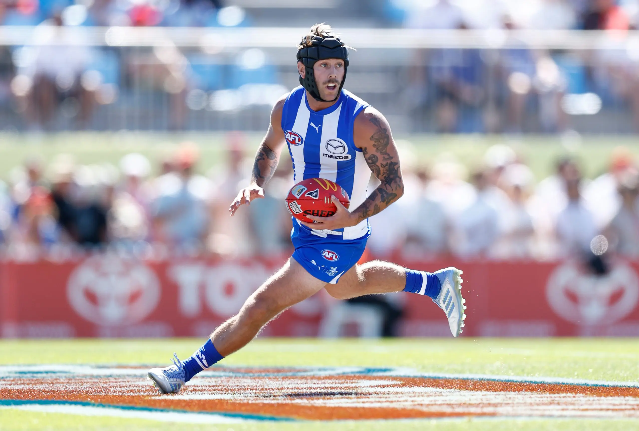 LYNDOCH, AUSTRALIA - APRIL 12: Caleb Daniel of the Kangaroos in action during the 2025 AFL Round 05 match between the North Melbourne Kangaroos and the Gold Coast Suns at Barossa Park on April 12, 2025 in Lyndoch, Australia. (Photo by Michael Willson/AFL Photos via Getty Images)