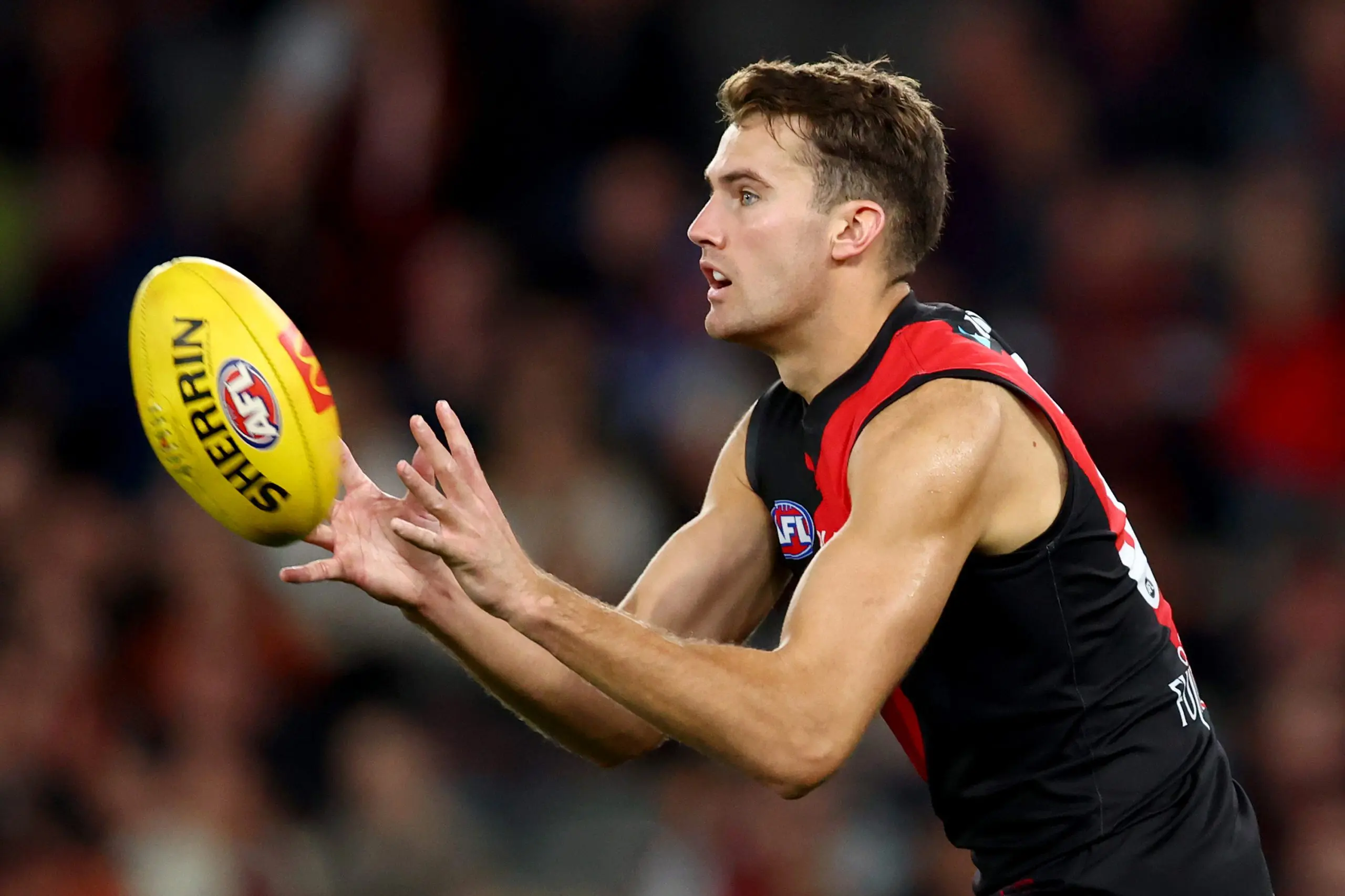 MELBOURNE, AUSTRALIA - MAY 01: Zach Reid of the Bombers marksduring the round eight AFL match between Essendon Bombers and North Melbourne Kangaroos at Marvel Stadium, on May 01, 2025, in Melbourne, Australia. (Photo by Josh Chadwick/Getty Images)