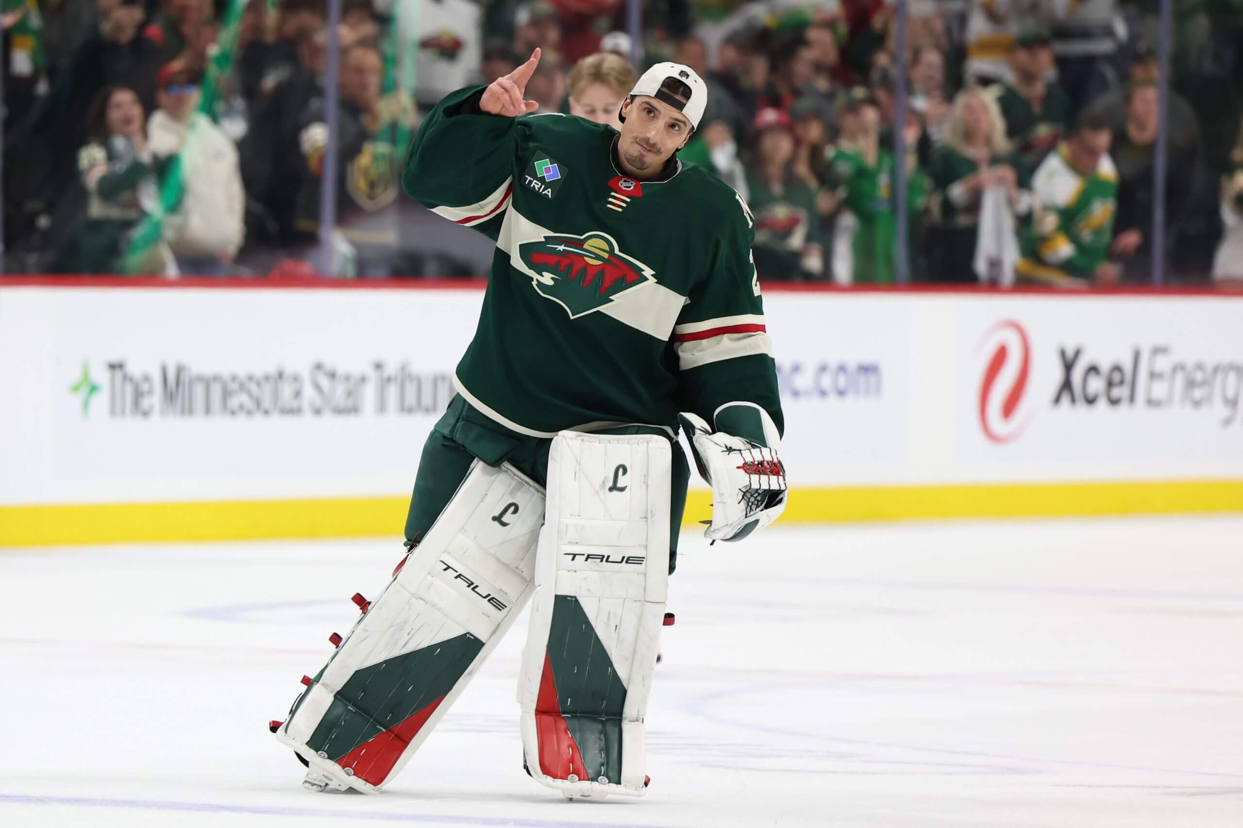 Marc-Andre Fleury skates while saluting the crowd in his final NHL game.