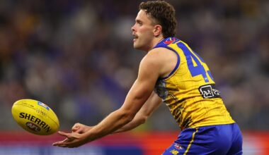 PERTH, AUSTRALIA - JULY 04: Tom McCarthy of the Eagles handballs during the round 17 AFL match between West Coast Eagles and GWS Giants at Optus Stadium on July 04, 2025 in Perth, Australia. (Photo by Paul Kane/Getty Images)