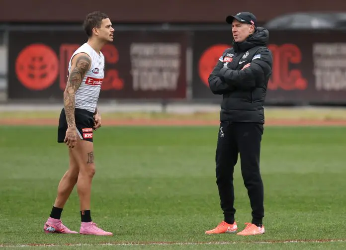 Collingwood Magpies Training Session MELBOURNE, AUSTRALIA - JULY 17: Bobby Hill of the Magpies speaks with Magpies coach Craig McRae during a Collingwood Magpies AFL training session at Olympic Park Oval on July 17, 2025 in Melbourne, Australia. (Photo by Robert Cianflone/Getty Images)