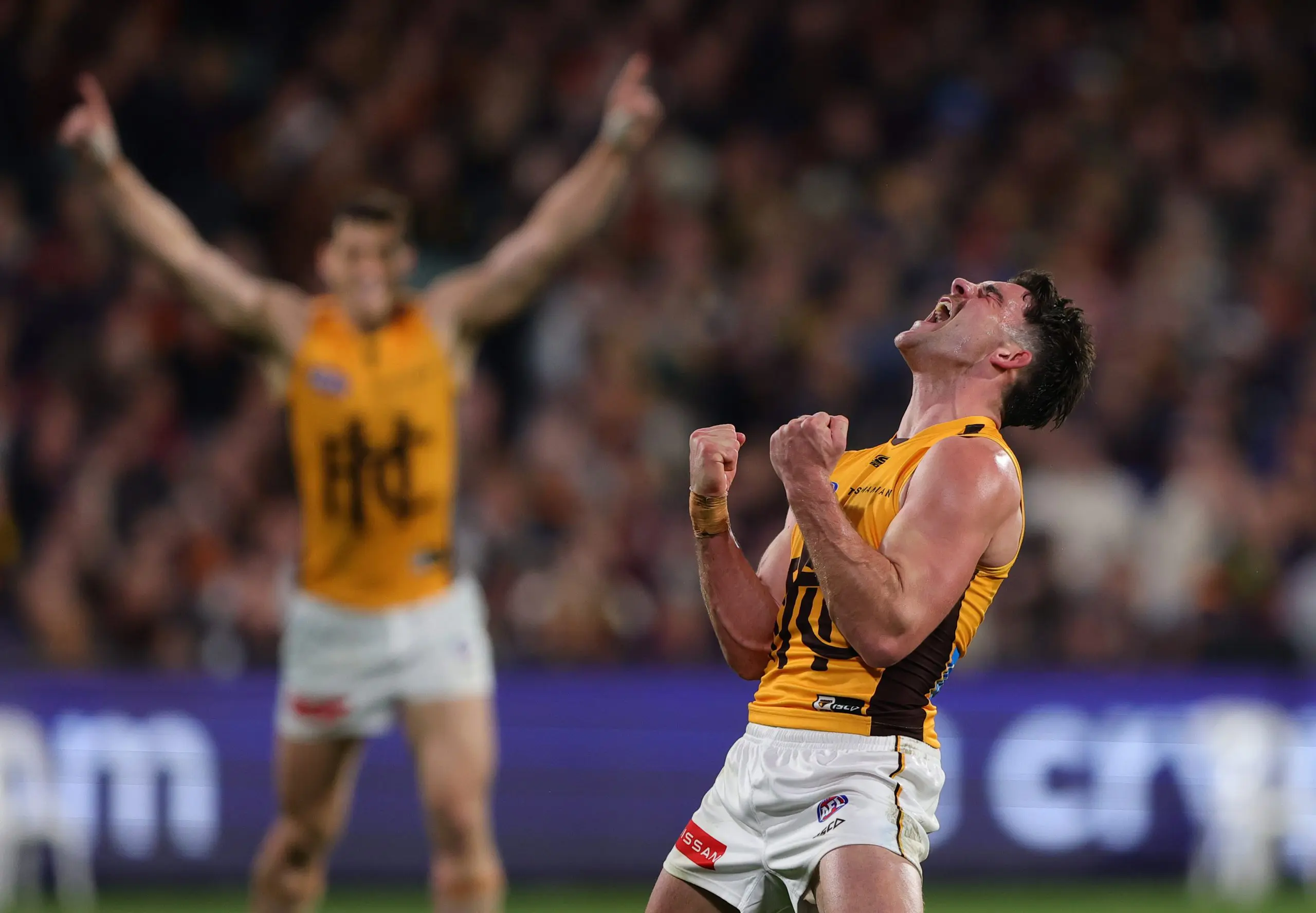 ADELAIDE, AUSTRALIA - SEPTEMBER 12: Jai Newcombe of the Hawks celebrates a goal during the AFL First Semi Final match between the Adelaide Crows and the Hawthorn Hawks at Adelaide Oval on September 12, 2025 in Adelaide, Australia. (Photo by Sarah Reed/AFL Photos via Getty Images)