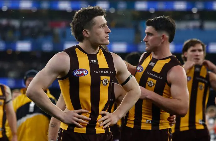 MELBOURNE, AUSTRALIA - SEPTEMBER 19: Josh Ward of the Hawks looks dejected after a loss during the AFL Second Preliminary Final match between the Geelong Cats and the Hawthorn Hawks at the Melbourne Cricket Ground on September 19, 2025 in Melbourne, Australia. (Photo by Michael Willson/AFL Photos via Getty Images)