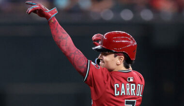 Corbin Carroll #7 of the Arizona Diamondbacks celebrates while rounding the bases after hitting a t...