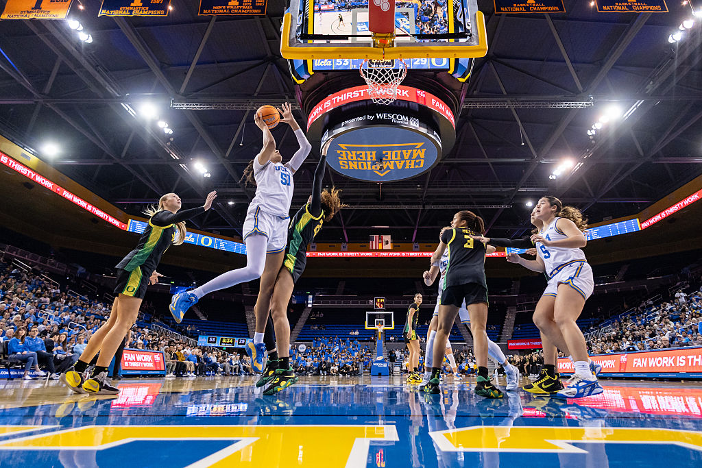 Center Lauren Betts #51 of the UCLA Bruins lays the ball up during the second half of a game against the Oregon Ducks at Pauley Pavilion on December 7, 2025 in Los Angeles, California.