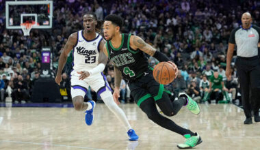 Anfernee Simons #4 of the Boston Celtics drives to the basket past Keon Ellis #23 of the Sacramento Kings in the second half at Golden 1 Center on January 01, 2026 in Sacramento, California. (Thearon W. Henderson/Getty Images)