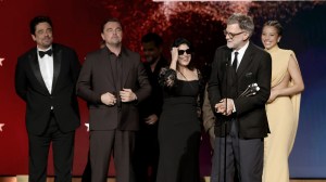 SANTA MONICA, CALIFORNIA - JANUARY 04: (L-R) Benicio del Toro, Leonardo DiCaprio, Cassandra Kulukundis, Paul Thomas Anderson and Chase Infiniti, winners of the Best Picture Award for "One Battle After Another", speak onstage during the 31st Annual Critics Choice Awards at Barker Hangar on January 04, 2026 in Santa Monica, California.  (Photo by Kevin Winter/Getty Images for Critics Choice Association)
