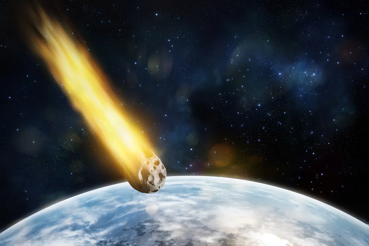 Artist's impression of an asteroid heading towards Earth. Credit: Maciej Frolow / Getty Images