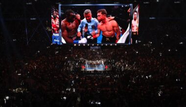 Canelo Alvarez and Terence Crawford stand face-to-face, touching gloves in the ring before their September 13, 2025 fight in Las Vegas.