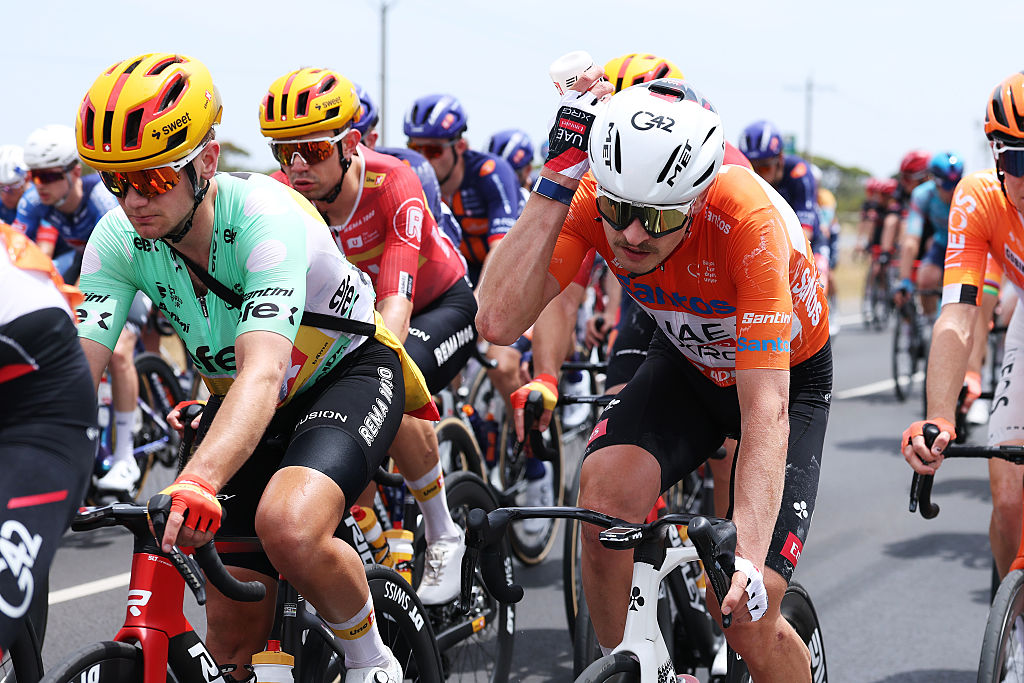 WILLUNGA, AUSTRALIA - JANUARY 24: (L-R) Martin Urianstad Bugge of Norway and Team Uno-X Mobility - Polka Dot Mountain Jersey and Jay Vine of Australia and UAE Team Emirates - Orange Santos Leader&amp;apos;s Jersey compete during the 26th Santos Tour Down Under 2026, Stage 4 a 130.8km stage from Brighton to Willunga / #UCIWT / on January 24, 2026 in Willunga, Australia. (Photo by Con Chronis/Getty Images)