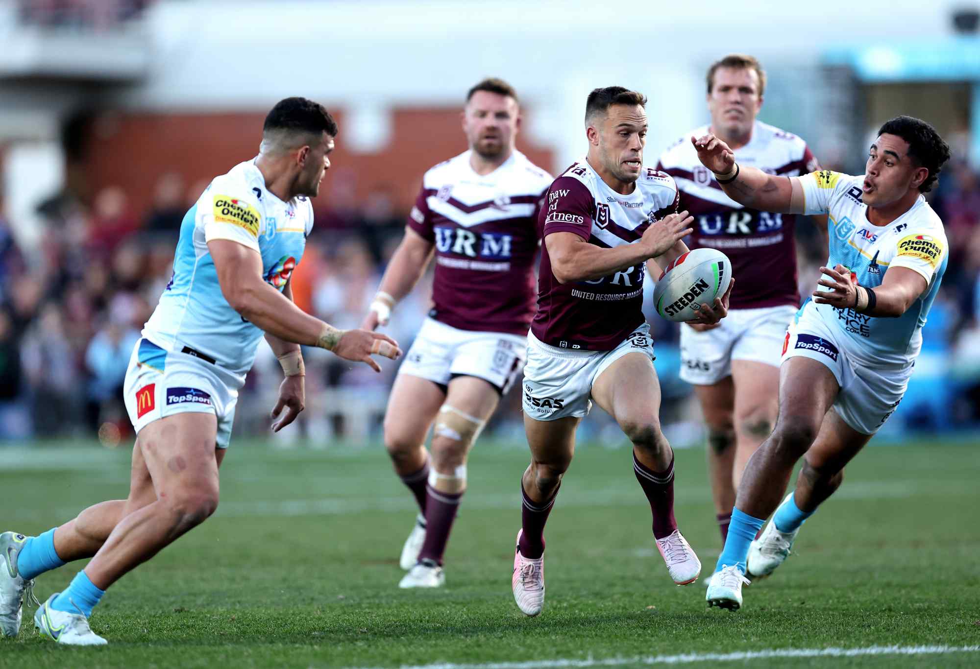 Luke Brooks of the Sea Eagles runs the ball during the round 20 NRL match between Manly Sea Eagles and Gold Coast Titans at 4 Pines Park, on July 21, 2024, in Sydney, Australia. (Photo by Brendon Thorne/Getty Images)