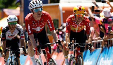 NORWOOD, AUSTRALIA - JANUARY 22: (L-R) Mauro Schmid of Switzerland and Team Jayco AlUla and Andreas Kron of Denmark and Team Uno-X Mobility cross the finish line during the 26th Santos Tour Down Under 2026, Stage 2 a 148.1km stage from Norwood to Uraidla 495m / #UCIWT / on January 22, 2026 in Norwood, Australia. (Photo by Con Chronis/Getty Images)