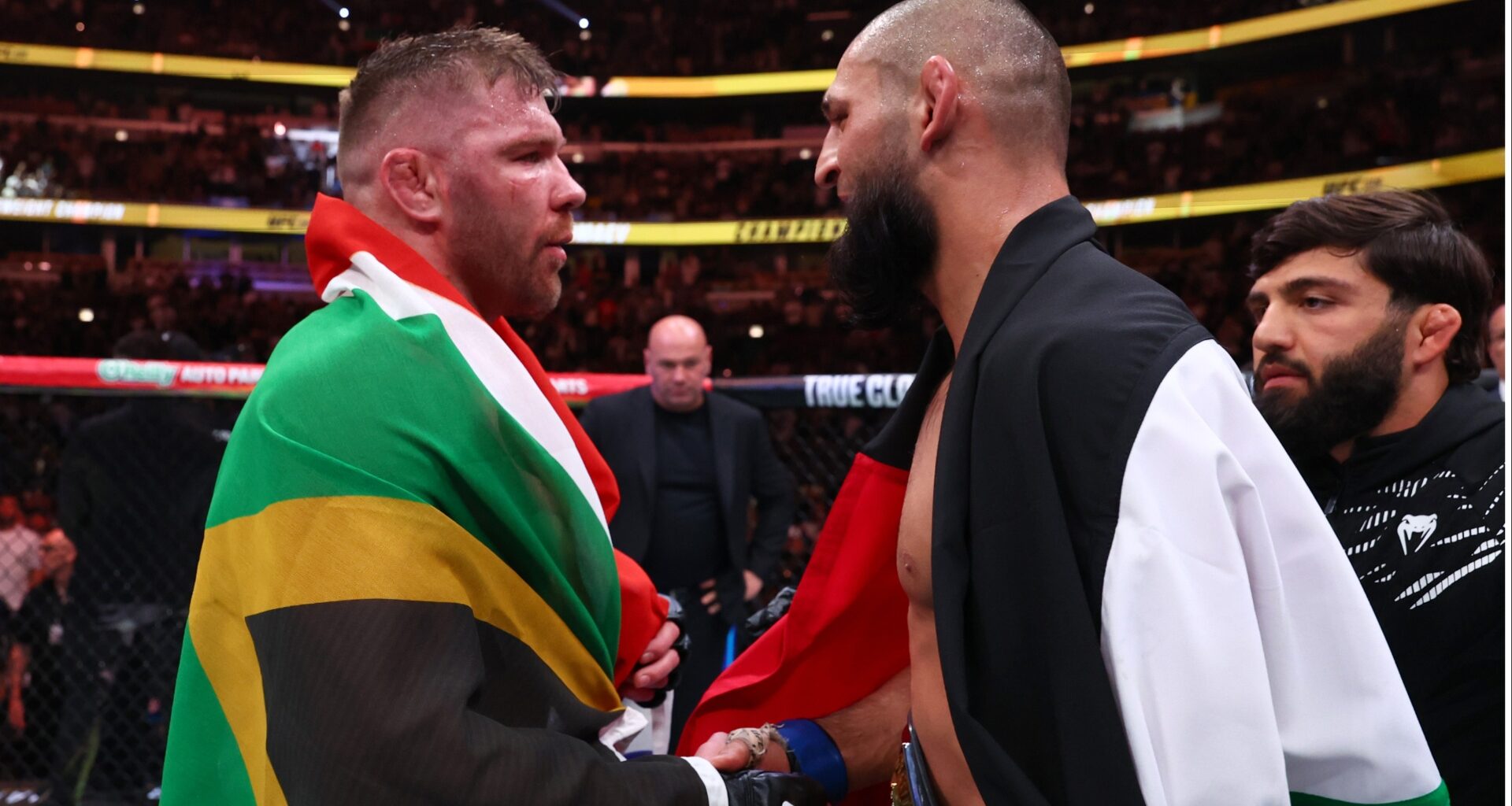 Dricus du Plessis congratulates Khamzat Chimaev after their fight at UFC 319