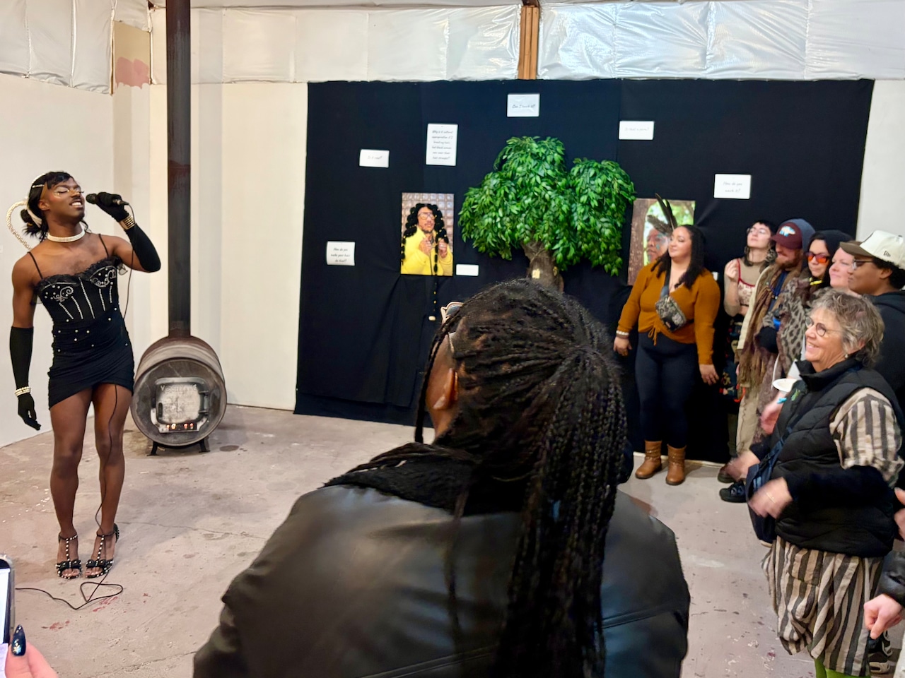 Opening night Jan. 3 at the Langford Art Gallery in Phoenix, Oregon Artist Crystal Proffitt’s installation “Don’t Touch My Hair: An Interactive Crowned Experience” includes a portrait of Jaalen Owens with attached braids that can turn the lights on a nearby tree.