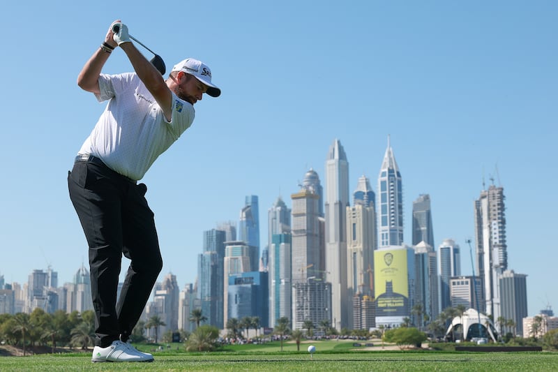 DUBAI, UNITED ARAB EMIRATES - JANUARY 22: Shane Lowry of Ireland tees off on the eighth hole, during day one of the Hero Dubai Desert Classic 2026 at Emirates Golf Club on January 22, 2026 in Dubai, United Arab Emirates. (Photo by Andrew Redington/Getty Images)