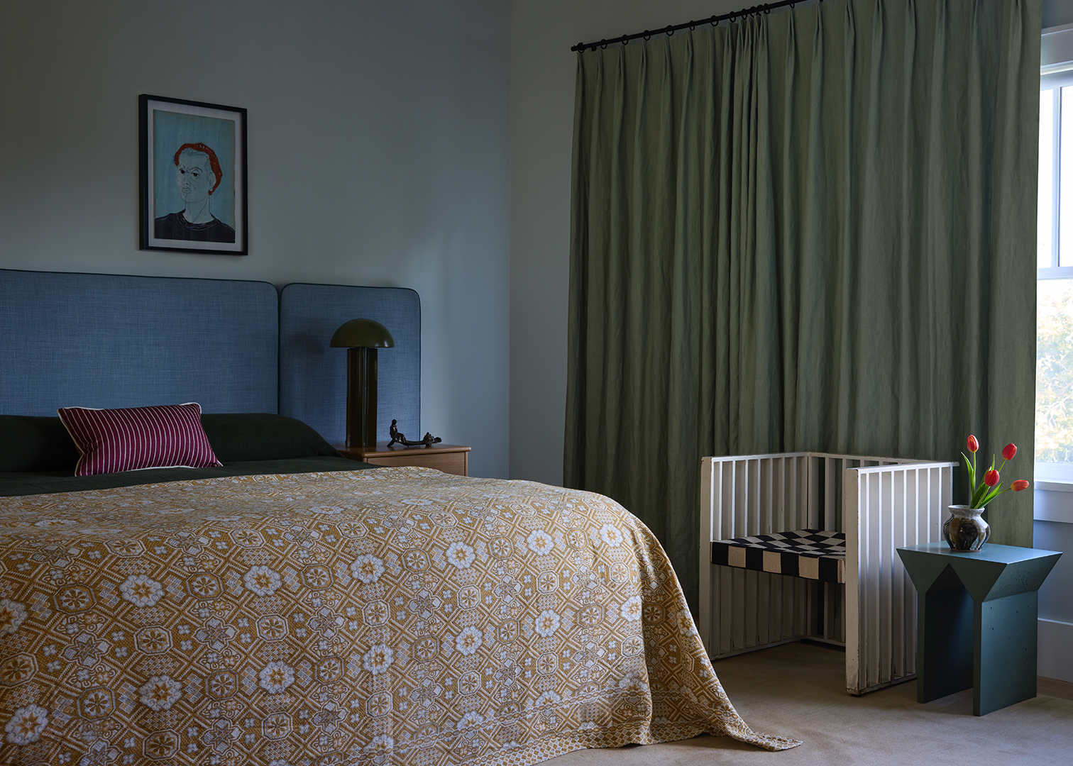 bedroom with thick green curtain 