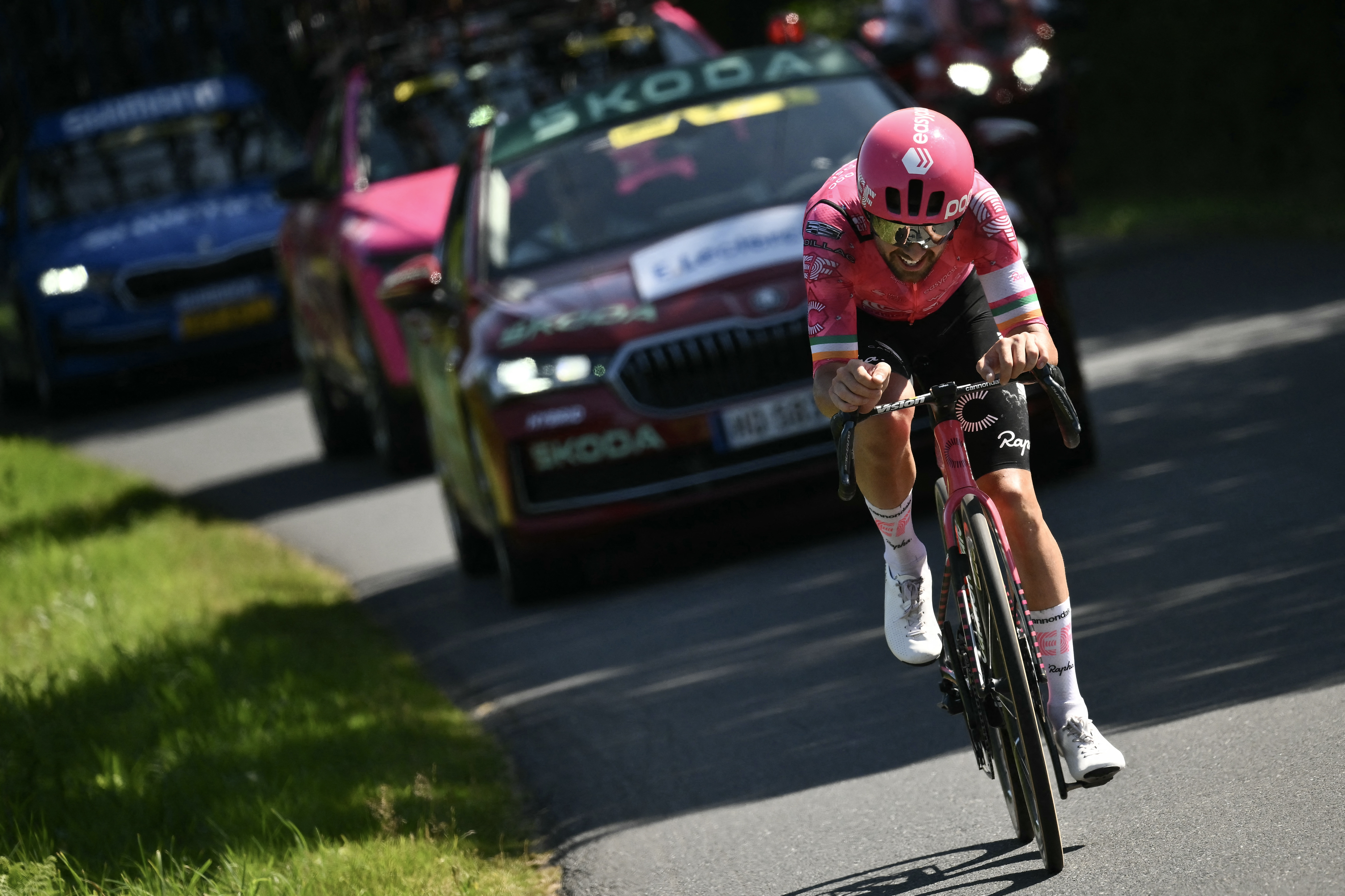 EF Education - EasyPost team's Irish rider Ben Healy cycles in a lone breakaway during the 6th stage of the 112th edition of the Tour de France cycling race, 201.5 km between Bayeux and Vire Normandie, Northwestern France, on July 10, 2025. (Photo by Marco BERTORELLO / AFP)