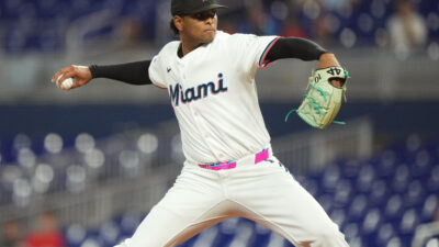 Aug 25, 2025; Miami, Florida, USA; Miami Marlins starting pitcher Edward Cabrera (27) pitches in the first inning against the Atlanta Braves at loanDepot Park. Mandatory Credit: Jim Rassol-Imagn Images