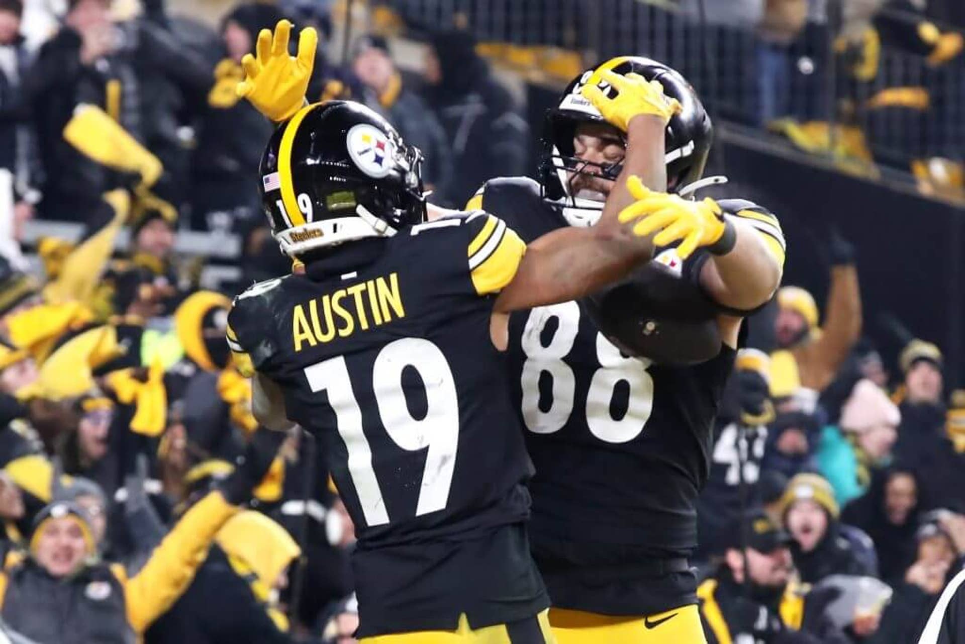 Pittsburgh Steelers wide receiver Calvin Austin celebrates with tight end Pat Freiermuth after catching a touchdown pass against the Baltimore Ravens.