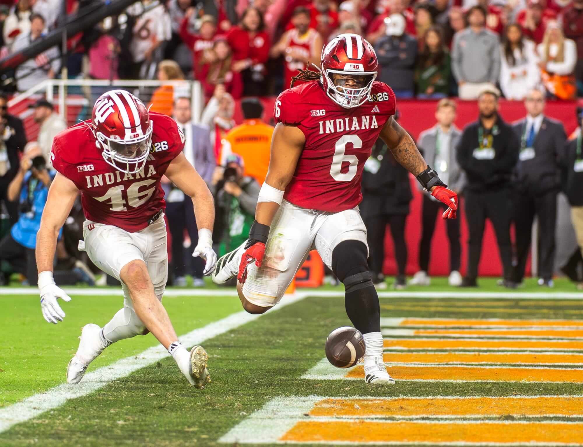 Indiana's Isaiah Jones jumps on the ball while Mikail Kamara watches.