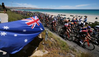 WILLUNGA HILL, AUSTRALIA - JANUARY 25: A general view of the peloton passing through Aldinga Beach landscape during the 25th Santos Tour Down Under 2025, Stage 5 a 145.7km stage from McLaren Vale to Willunga Hill 371m / #UCIWT / on January 25, 2025 in Willunga Hill, Australia. (Photo by Dario Belingheri/Getty Images)