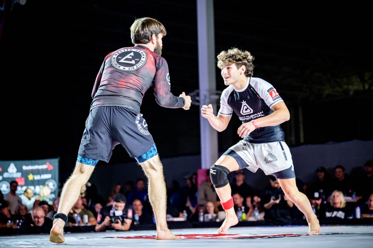 Fighter Kai Saturno, right, against Ben Price at the Jeff Curran Invitational on Sept. 6, 2025 at the MAC Sports Center in Crystal Lake.