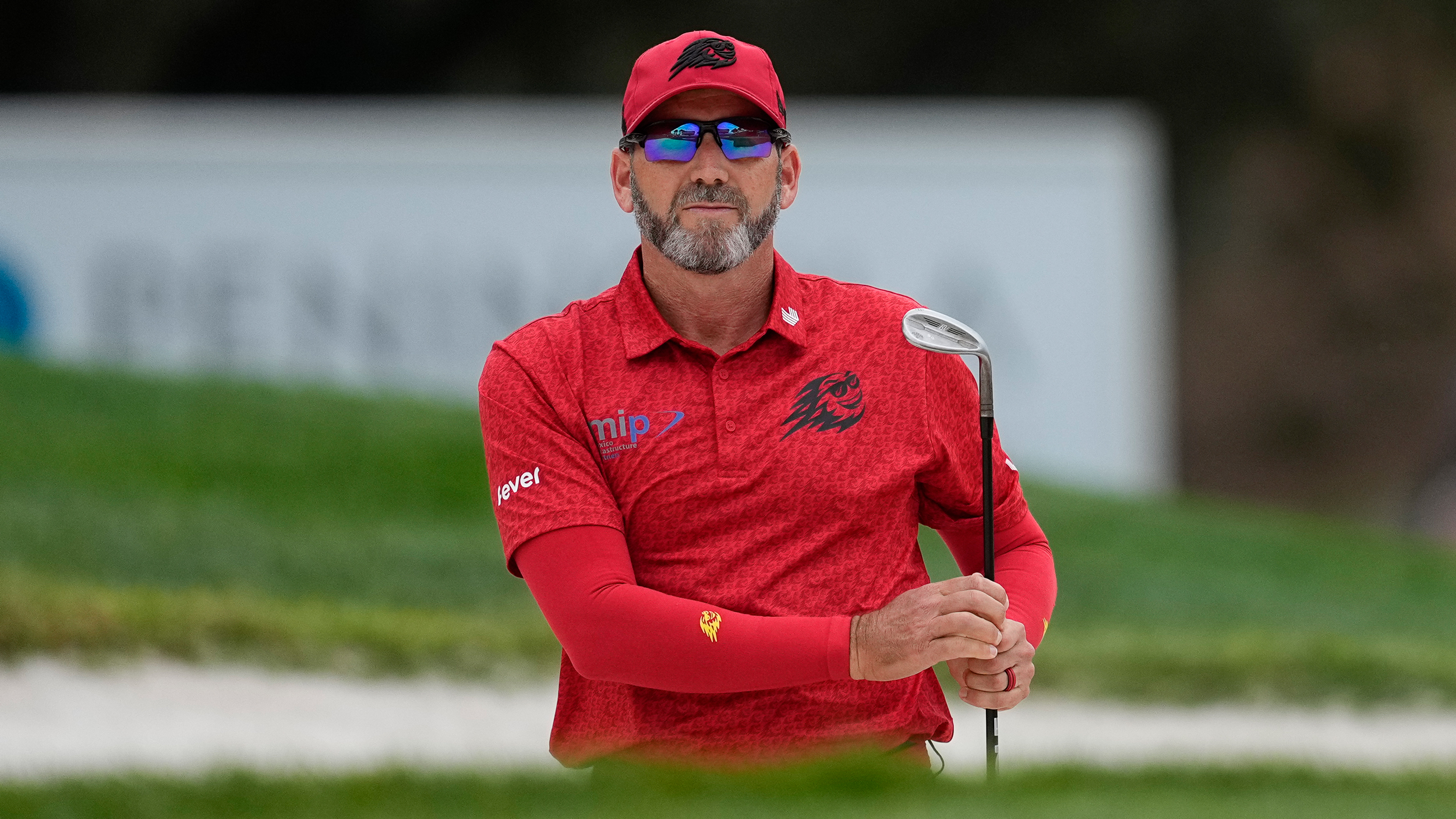 Sergio Garcia watches a bunker shot