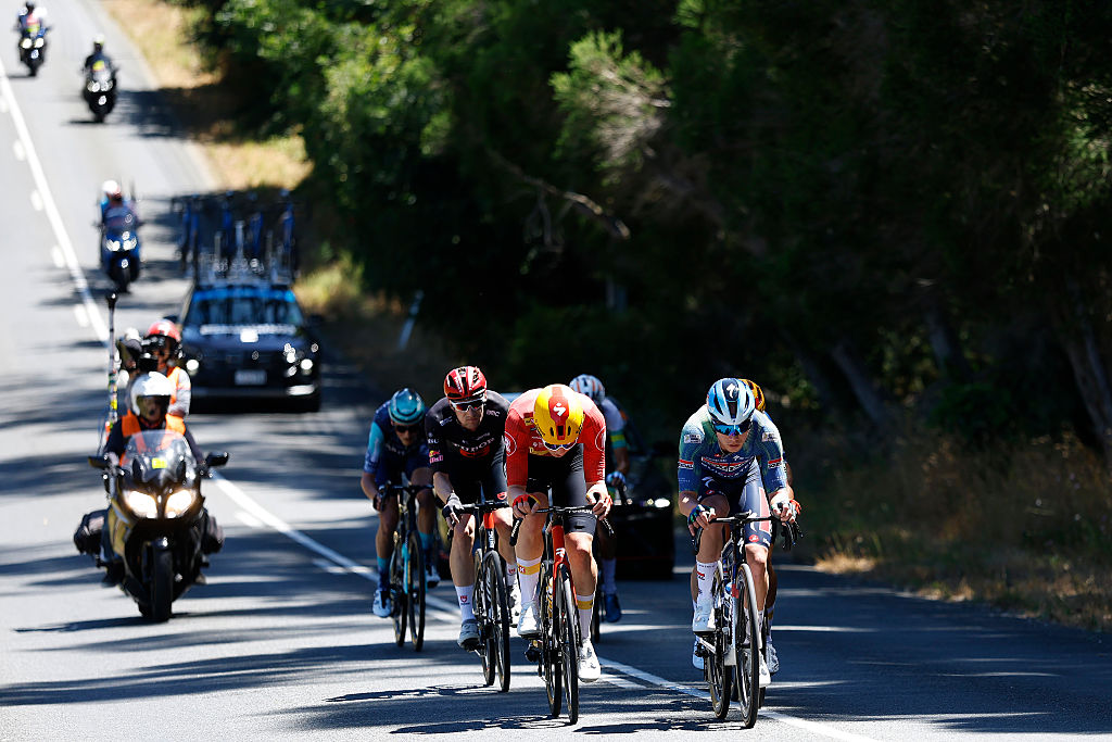 NORWOOD, AUSTRALIA - JANUARY 22: (L-R) Joel Suter of Switzerland and Tudor Pro Cycling Team, Storm Ingebrigtsen of Norway and Team Uno-X Mobility and Pepijn Reinderink of Netherlands and Team Soudal Quick-Step compete in the breakaway during the 26th Santos Tour Down Under 2026, Stage 2 a 148.1km stage from Norwood to Uraidla 495m / #UCIWT / on January 22, 2026 in Norwood, Australia. (Photo by Con Chronis/Getty Images)