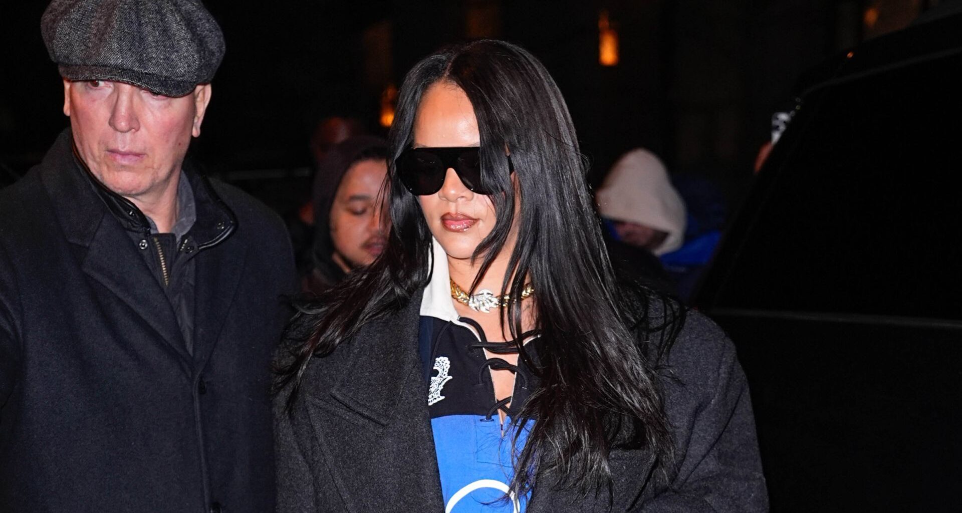 Rihanna revives 2025's rugby shirt trend, paired with layered jackets, white pointed-toe pumps, and Balenciaga pants