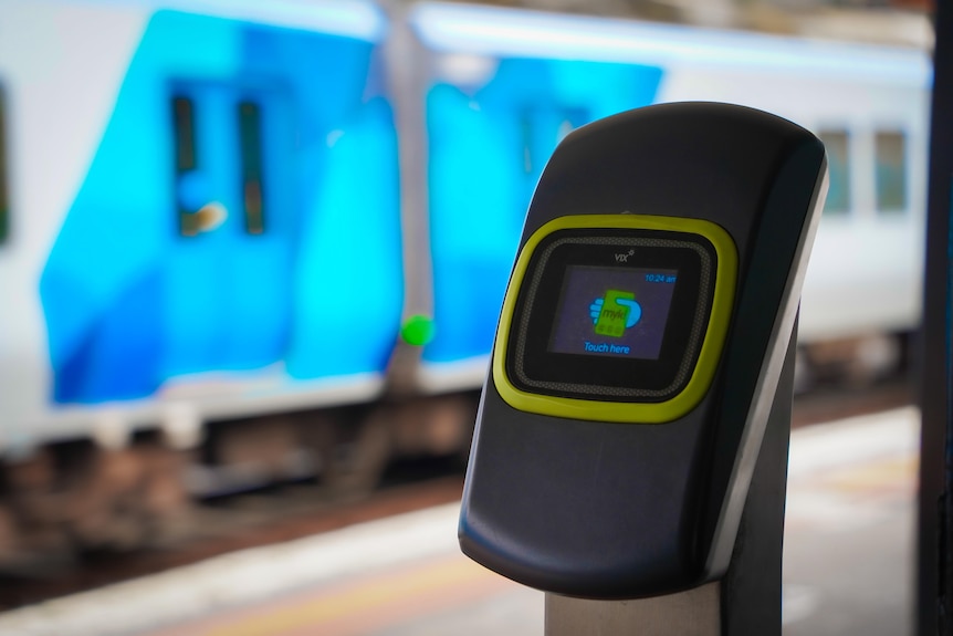 A close-up of a machine used to touch on in Melbourne's myki ticketing system.