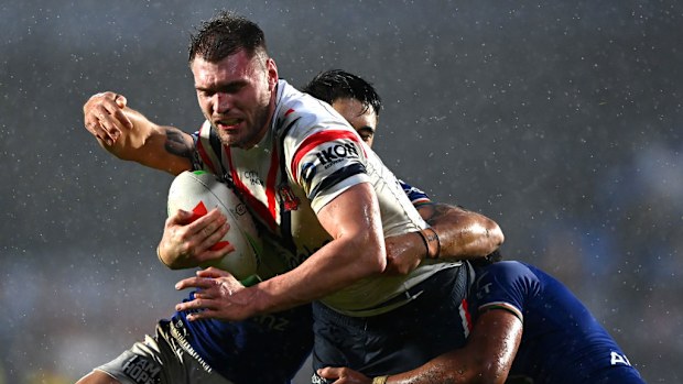Angus Crichton of the Roosters charges forward at Mt Smart Stadium.