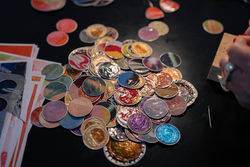 Squashed coffee pods and patterned earrings
