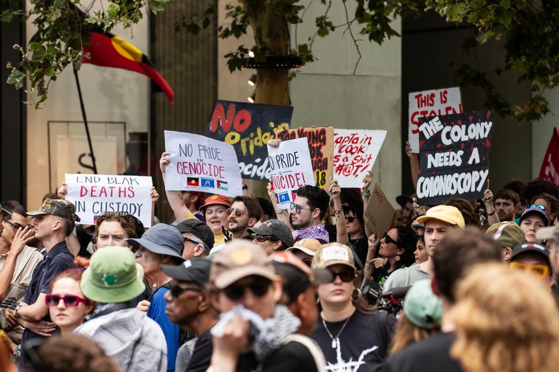 Signs at the Invasion Day rally.