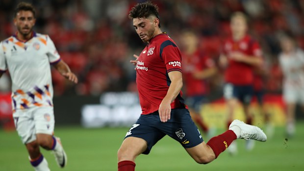 Adelaide United's Josh Cavallo in action during the 2024 A-League Men round 16 clash against Perth Glory.