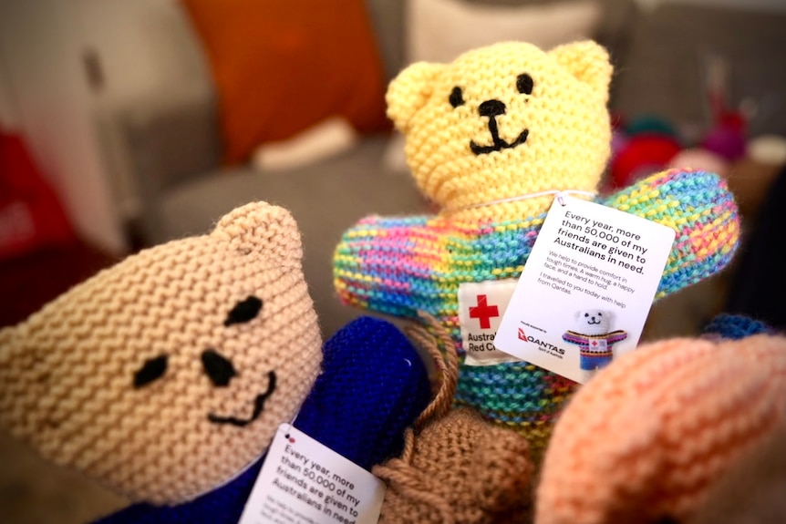 Lucinda Nube Red Cross Volunteer with her knitted trauma teddy