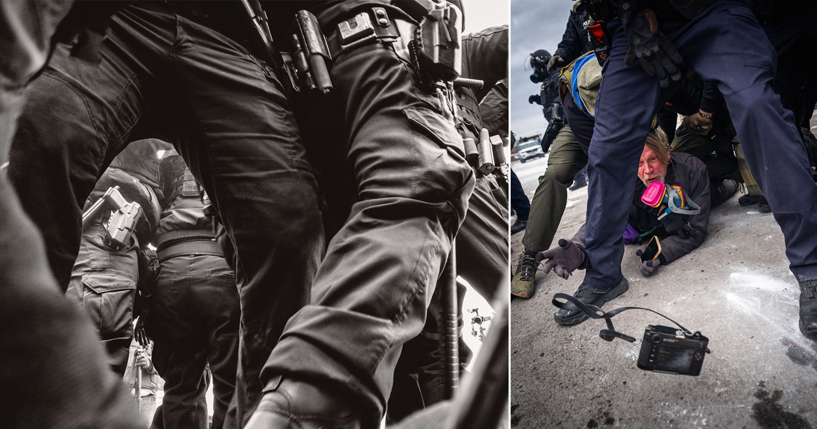 A man wearing a gas mask crouches on the ground amid armed police officers in tactical gear; a camera lies on the pavement nearby. The scene appears tense and chaotic.