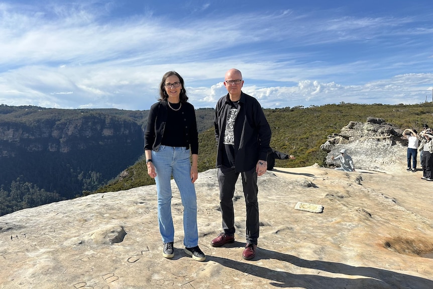 Ramona Hollywood and Mark Greenhill stand side-by-side at the lookout.