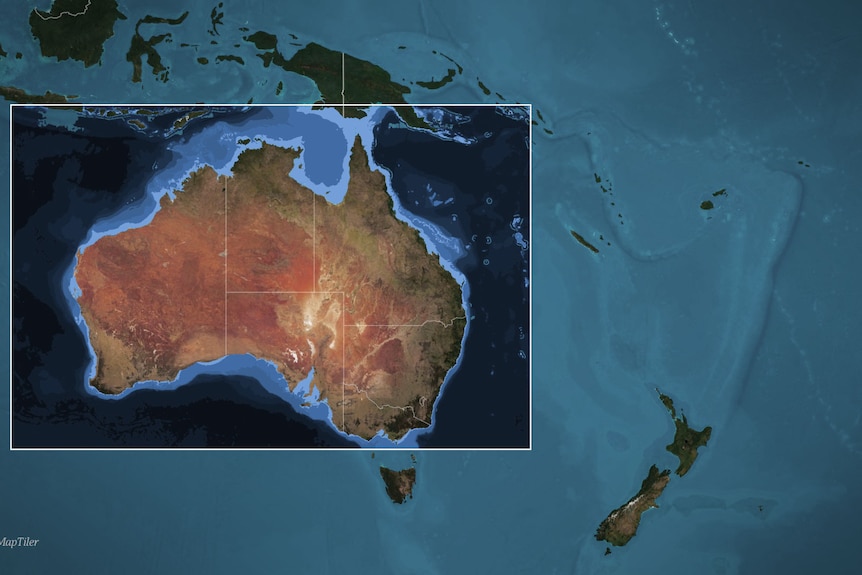 Different shades of blue indicate the depth of ocean waters around Australia.