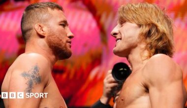 Justin Gaethje and Paddy Pimblett face off with the UFC belt in between them