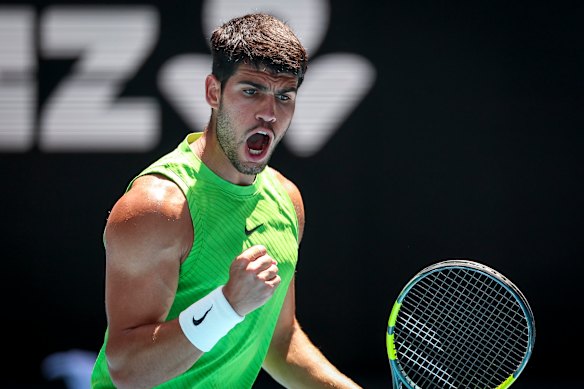 Carlos Alcaraz celebrates during his clash with Tommy Paul.