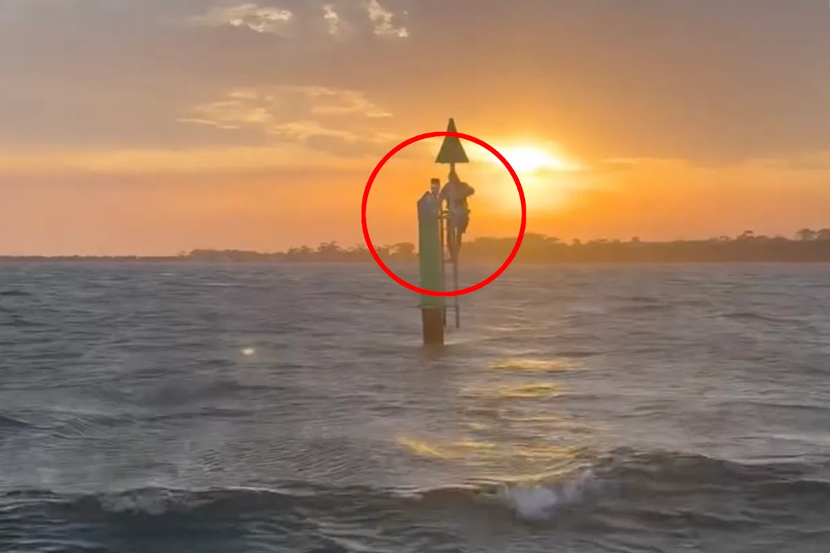 Utter disbelief as fishermen find 'pale' man clinging to pole kilometres from shore: 'Struggling to hold on'