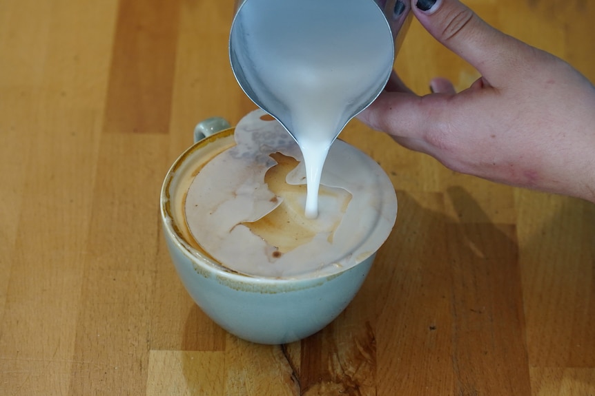 A coffee being poured