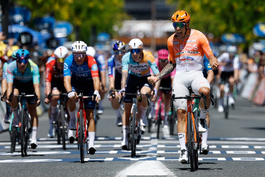 Sam Welsford crosses the line