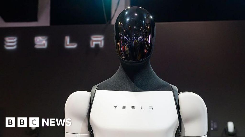 Tesla sees first annual revenue drop as it shifts to AI and robots - BBC