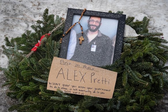 A photo of Alex Pretti at a memorial set up in his honour in Minneapolis.